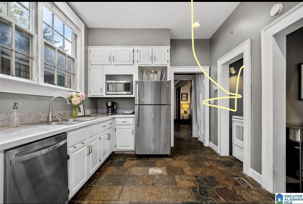 Birmingham kitchen — MLS before photo showing slate floor, white cabinets, and dated layout